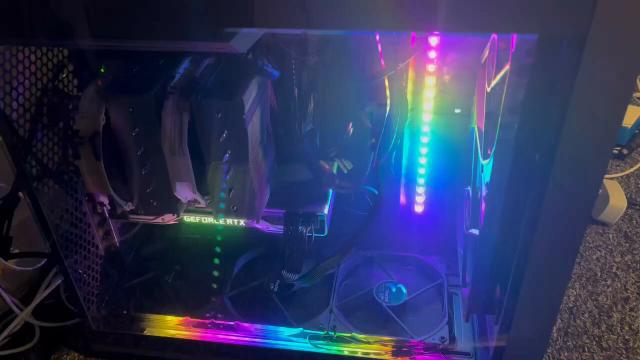 RGB LED strips doing a rainbow inside the Fractal Torrent PC case