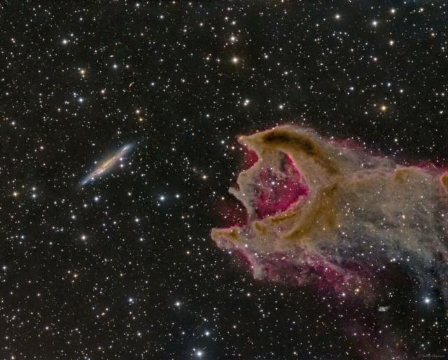 The featured image shows a distant galaxy on the left next to a gas cloud on the right. An opening in the gas cloud is on the same side as the galaxy.