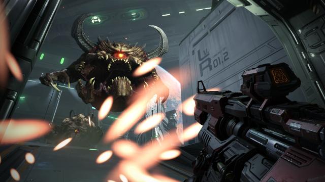 DOOM Eternal screenshot fighting demons with a big gun pew pew pew