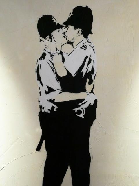 Two coppers kissing.