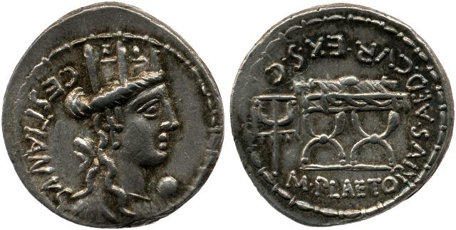 roman coin with cybele on one side and a curule with stone upon it.