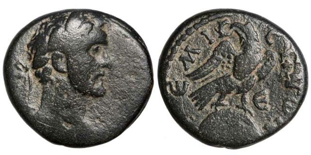Eagle perched atop the conical baetyl of Emesa. Head of Antoninus Pius. (142-143 CE) Emesa, Syria. About 70 years before it was transported to Rome.