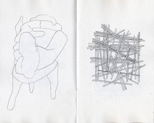 pieces of wood and a weird sculpture melting form