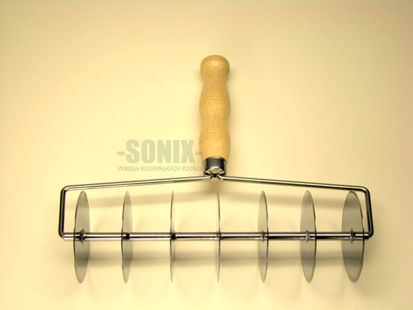 Pastry roller cutter with 7 circular blades - or possibly a 7 bladed sword, depending on your definitions.