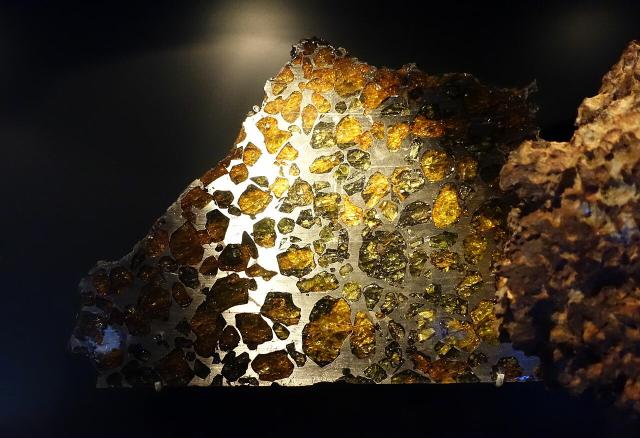 The Esquel Pallasite was found in 1951 near a town in the province of Chubut, Argentina. Etched slices of the Esquel Pallasite make some of the most beautiful pieces of art.

Exhibit in Museum für Naturkunde, Berlin, Germany. Daderot, CC0, via Wikimedia Commons.