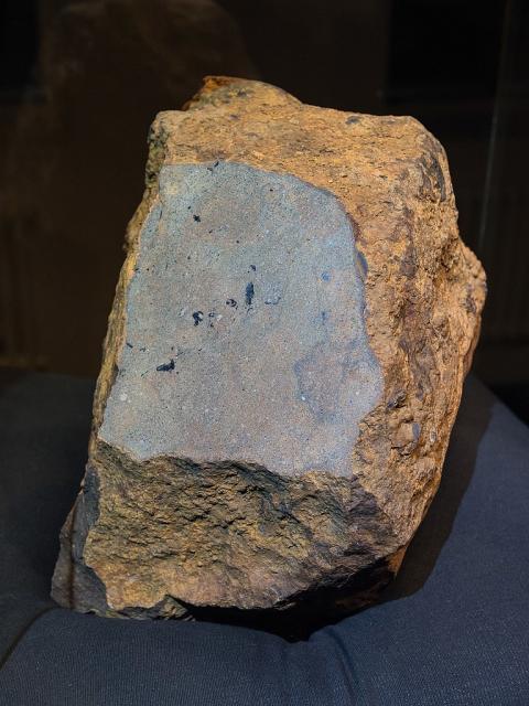 Polished side of the Blaubeuren Meteorite; this meteorite was found in Mr. Hansjörg Bayer's garden in 1989 (Blaubeuren-Weiler, Germany). It was not until 2020 that it was tested and classified as a meteorite.