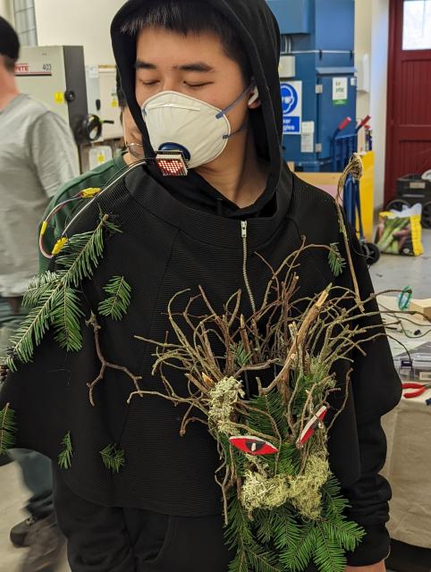 Students building interactive electronics 