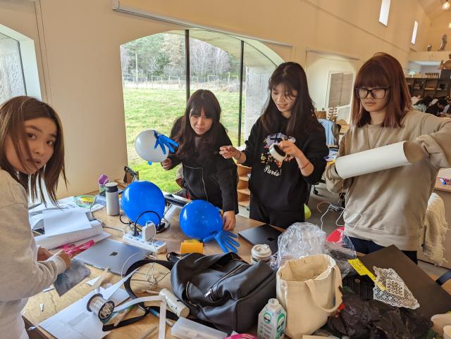Students building interactive electronics 