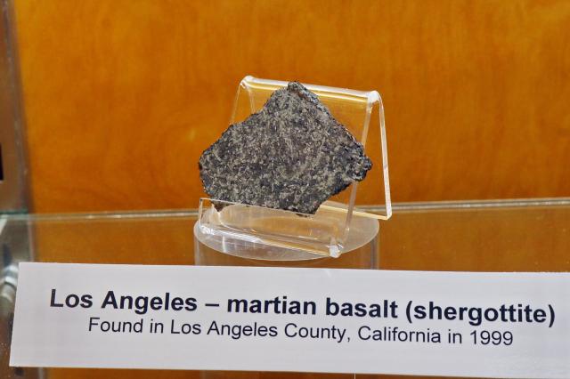 A slice of the Los Angeles Meteorite on display at UCLA. Found in 1999; Los Angeles, California.

My profile's avatar comes from a thin section of this meteorite.