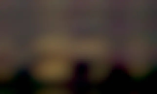 A picture of the remnant pillars of Poseiden is shown, an ancient Greek Temple. In the middle of the ruins, far in the distance, is a crescent Moon.