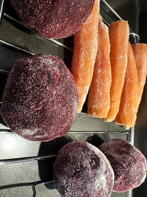Closeup of the beets and carrots dusted with koji