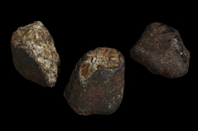 Three small pieces of the Pultusk Meteorite; it fell on January 30, 1868 in Poland.

Photographer: Rodney Start. Copyright Museums Victoria / CC BY (Licensed as Attribution 4.0 International)