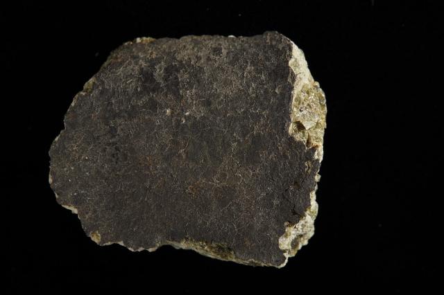 Johnstown Meteorite; fell July 6, 1924 in Colorado, USA.

Photographer: Rodney Start. Copyright Museums Victoria / CC BY (Licensed as Attribution 4.0 International)