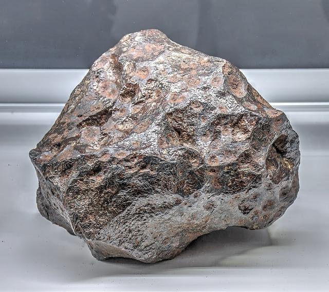 Canyon Diablo Meteorite; found 1891 Arizona, USA. Photo taken at the Pisgah Astronomical Research Institute.

Dsdugan, CC0, via Wikimedia Commons.